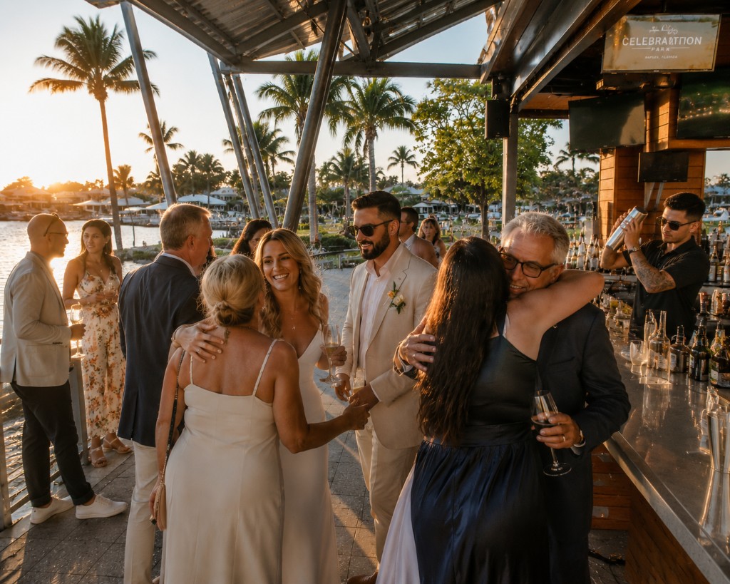 Family and friends gathering for a relaxed waterfront rehearsal dinner at Celebration Park Naples